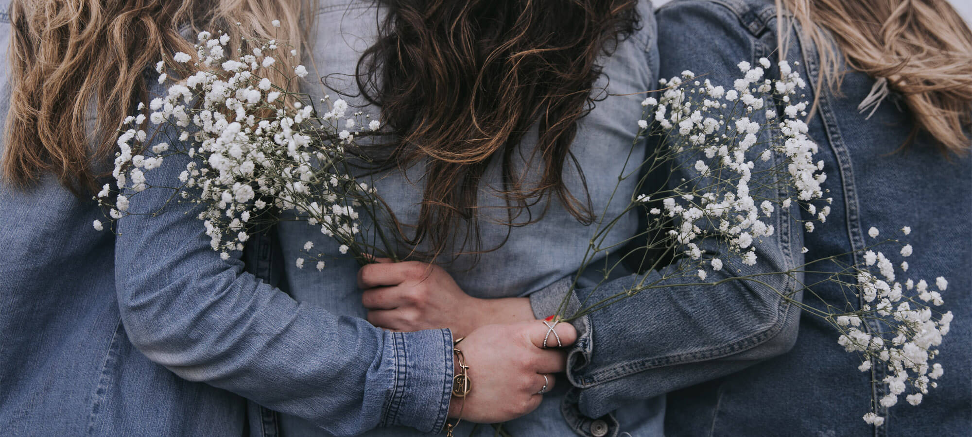 Women holding flowers